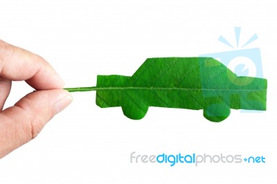 Green Car Cut From Leaf Stock Photo