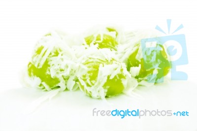 Green Coconut Muchkins On White Floor Stock Photo