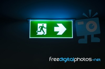 Green Emergency Exit Sign The Way To Escape Stock Photo