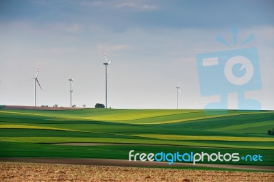 Green Environment. Eco Power. Wind Turbines Generating Electrici… Stock Photo