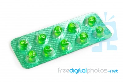 Green Flatulence Pill In The Blister Pack Stock Photo