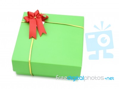 Green Gift Box With Red Ribbon Bow Isolated On White Background Stock Photo