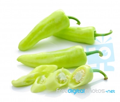 Green Hot Chili Pepper On White Stock Photo