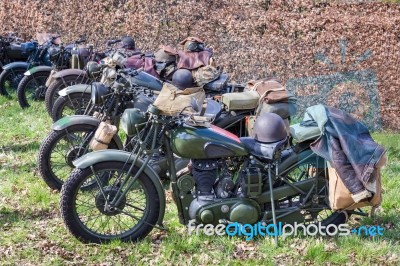 Green Military Motorcycles Parked In A Row Stock Photo