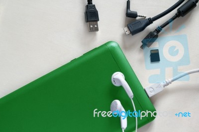 Green Mobile Phone Accessories Stock Photo