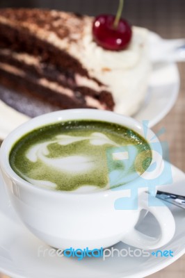 Green Tea And Cheesecake Stock Photo