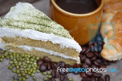 Green Tea Cake And Coffee Stock Photo