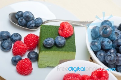 Green Tea Matcha Mousse Cake With Berries Stock Photo