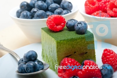 Green Tea Matcha Mousse Cake With Berries Stock Photo