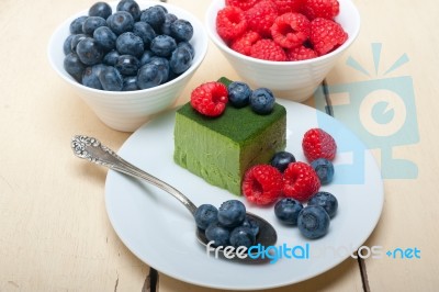 Green Tea Matcha Mousse Cake With Berries Stock Photo