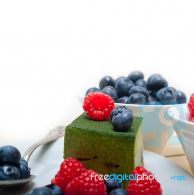 Green Tea Matcha Mousse Cake With Berries Stock Photo