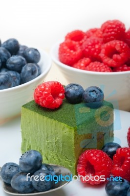 Green Tea Matcha Mousse Cake With Berries Stock Photo