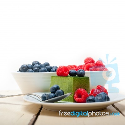 Green Tea Matcha Mousse Cake With Berries Stock Photo