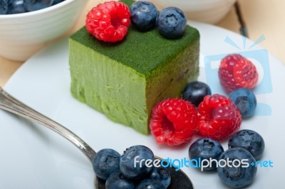 Green Tea Matcha Mousse Cake With Berries Stock Photo