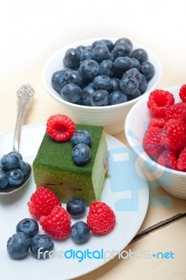 Green Tea Matcha Mousse Cake With Berries Stock Photo