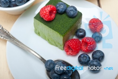 Green Tea Matcha Mousse Cake With Berries Stock Photo