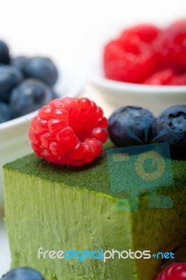 Green Tea Matcha Mousse Cake With Berries Stock Photo