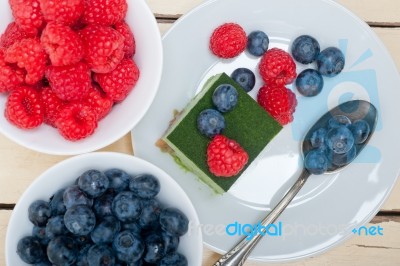 Green Tea Matcha Mousse Cake With Berries Stock Photo