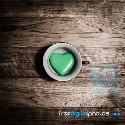 Greenheart Ceramic In Coffee Cup Stock Photo