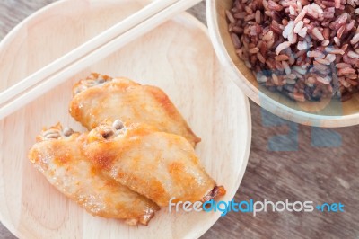 Grilled Chicken Wings With Multi Grains Berry Rice Stock Photo