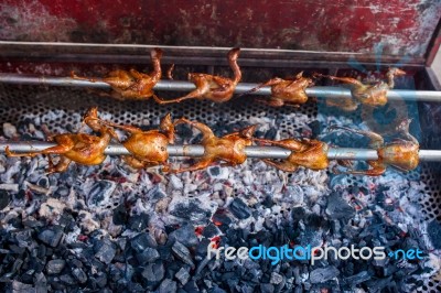 Grilled Chickens On The Bbq Stove Stock Photo