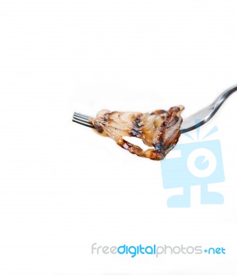 Grilled Onion On A Fork Stock Photo