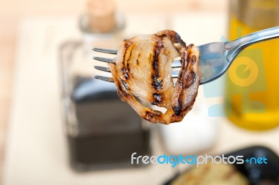 Grilled Onion On A Fork Stock Photo