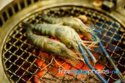 Grilling Prawn On Grill Stock Photo