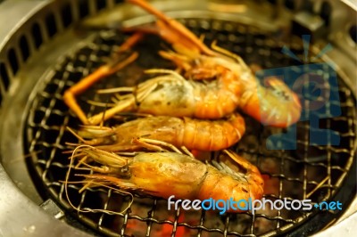 Grilling Prawn On Grill Stock Photo