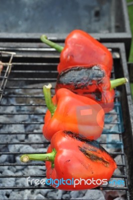 Grilling Red Peppers Stock Photo