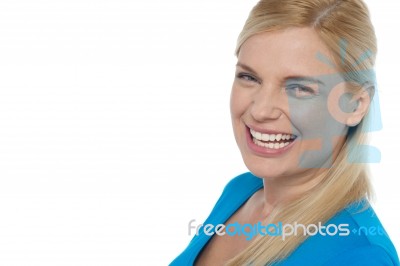 Grin Of A Gorgeous Young Laughing Woman Stock Photo