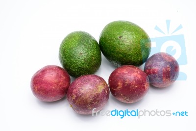 Group Of Avocados And Passion Fruit Isolated On A White Backgrou… Stock Photo