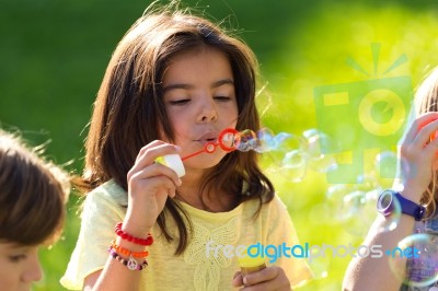 Group Of Childrens Having Fun In The Park Stock Photo