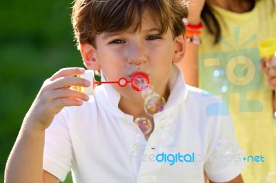 Group Of Childrens Having Fun In The Park Stock Photo