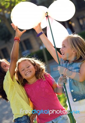 Group Of Childrens Having Fun In The Park Stock Photo