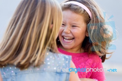 Group Of Childrens Having Fun In The Park Stock Photo