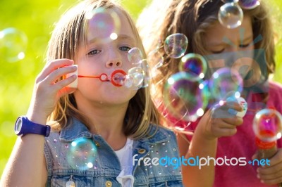 Group Of Childrens Having Fun In The Park Stock Photo