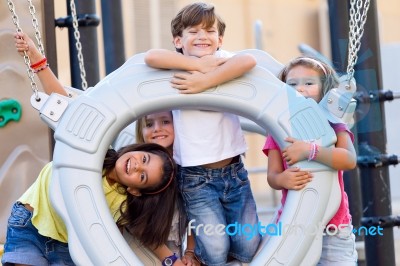 Group Of Childrens Having Fun In The Park Stock Photo