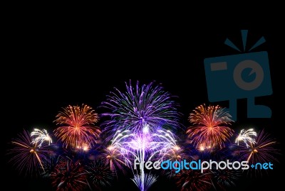 Group Of Colorful Fireworks On Dark Background Stock Photo