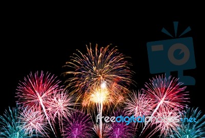 Group Of Colorful Fireworks On Dark Background Stock Photo