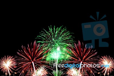 Group Of Colorful Fireworks On Dark Background Stock Photo