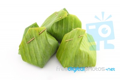 Group Of Dessert Banana Leaf Package With Bamboo Stick Stock Photo