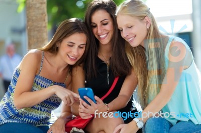 Group Of Friends Having Fun With Smartphones Stock Photo