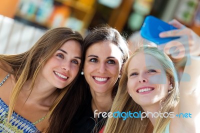 Group Of Friends Taking Selfie In The Street Stock Photo