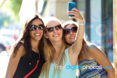 Group Of Friends Taking Selfie In The Street Stock Photo