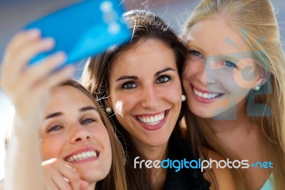 Group Of Friends Taking Selfie In The Street Stock Photo