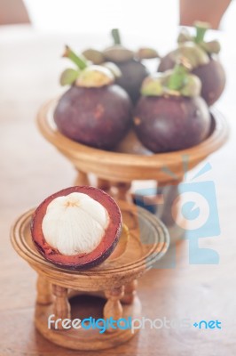 Group Of Mangoesteen On Wooden Tray Stock Photo