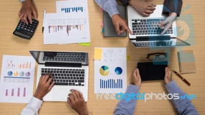 Group Of Multiethnic Busy People Working In An Office Stock Photo