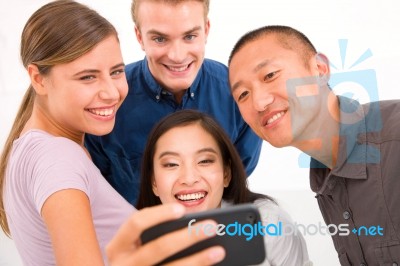 Group Of Multiethnic Friends Taking Self Portrait Stock Photo