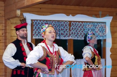 Group Of Singers And Dancers In Full Polish National Costume Stock Photo